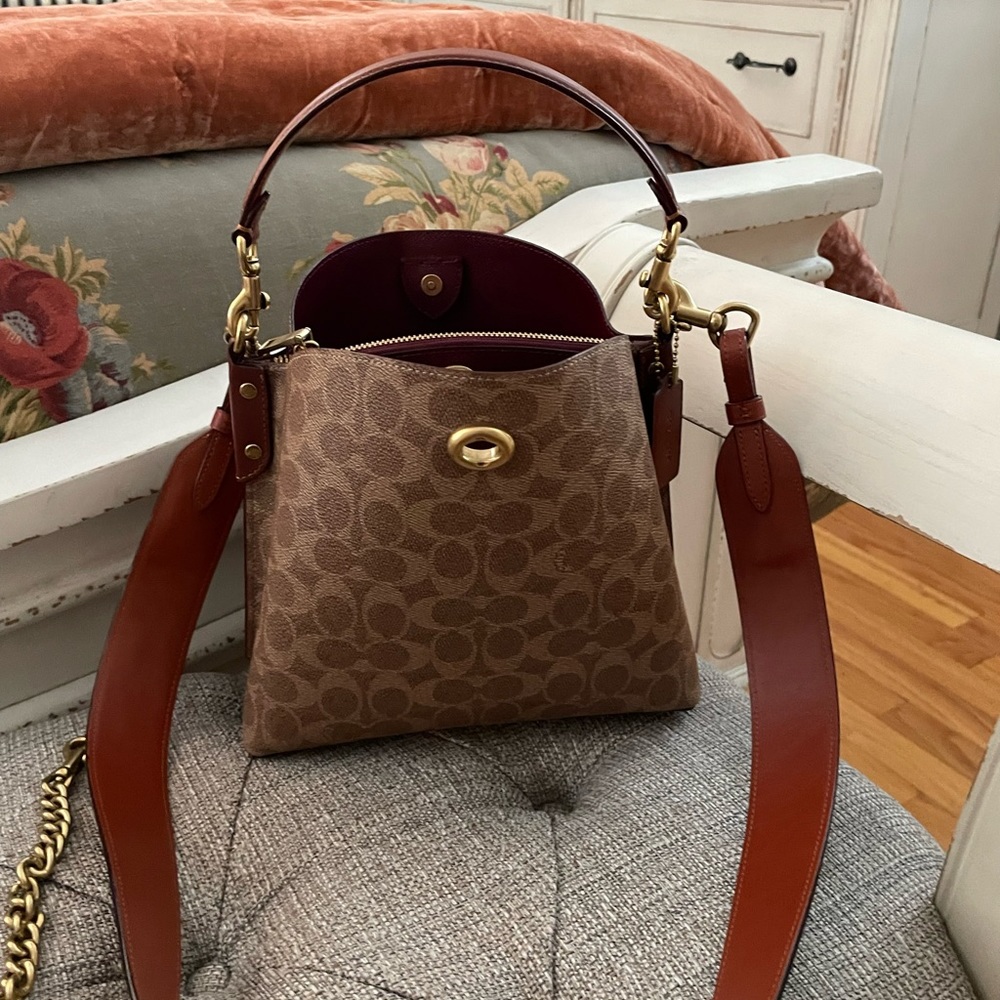 Two like new Coach Monogram Handbags with six different straps & matching wallet